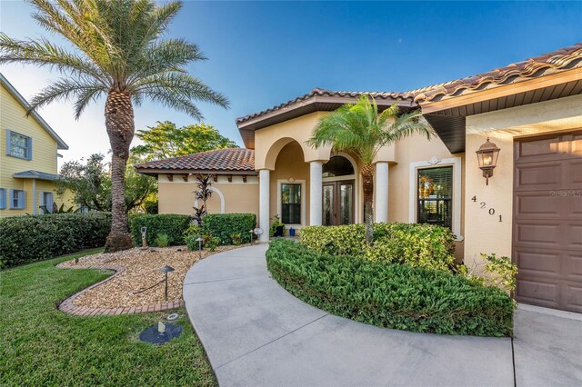 view of front of home with a garage