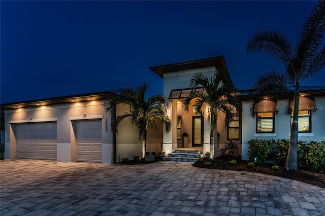 view of front of house with a garage