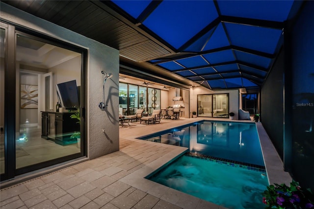 view of pool featuring a lanai and a patio area