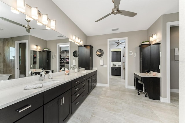 bathroom with ceiling fan, tile patterned flooring, vanity, and toilet