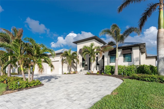 mediterranean / spanish house with a garage