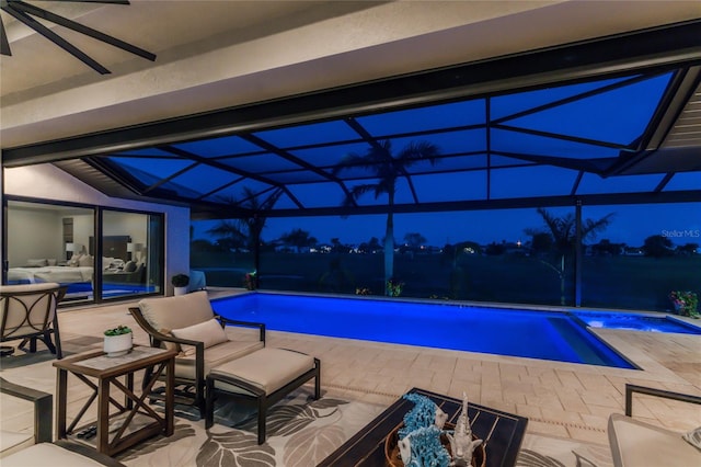 view of pool with ceiling fan