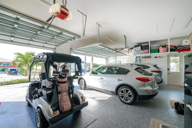 garage featuring a garage door opener