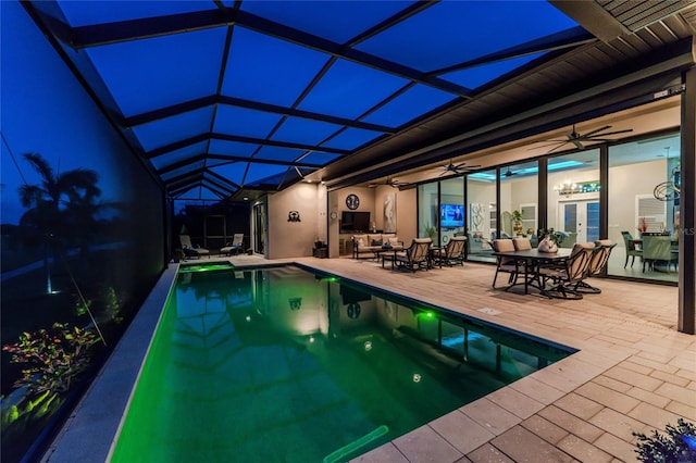 view of pool featuring a patio, a lanai, and ceiling fan