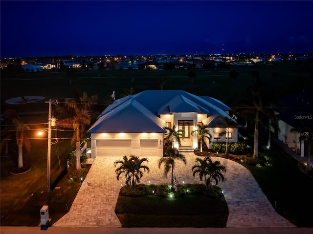 view of front of home featuring a garage