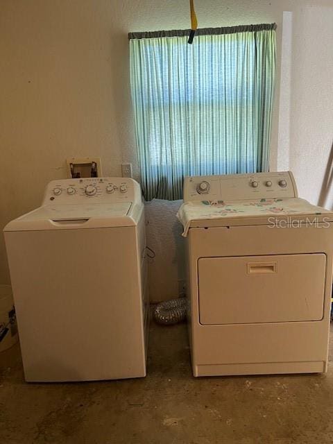 washroom featuring separate washer and dryer