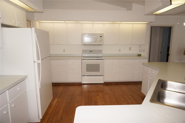 kitchen with white cabinetry, dark wood-type flooring, sink, and white appliances