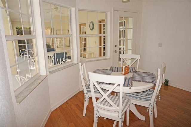 dining room featuring wood-type flooring