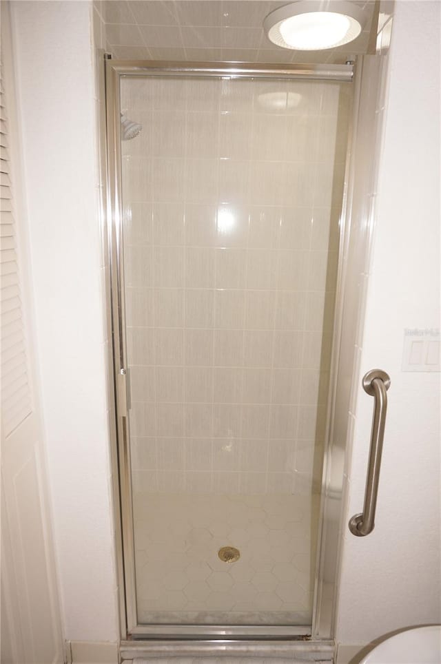 bathroom with an enclosed shower