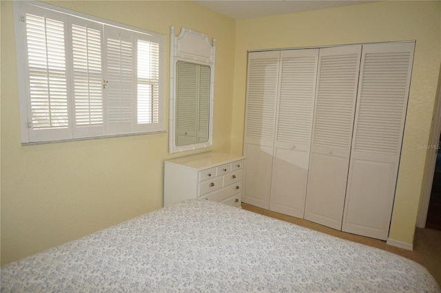 unfurnished bedroom with a closet