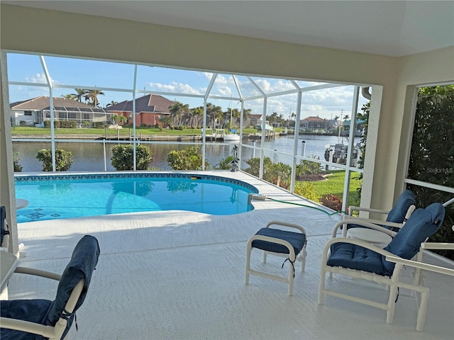 view of pool with a water view