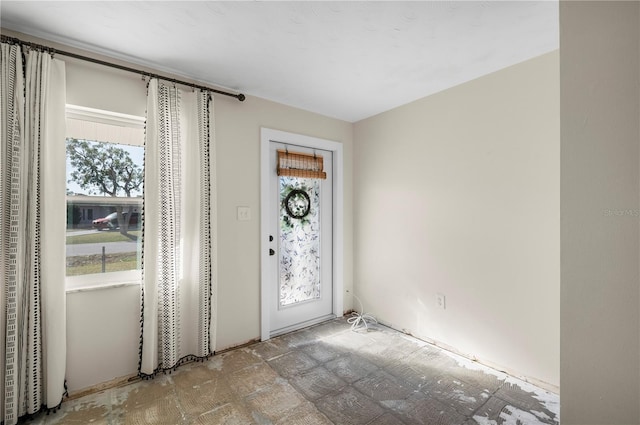 foyer entrance featuring a healthy amount of sunlight