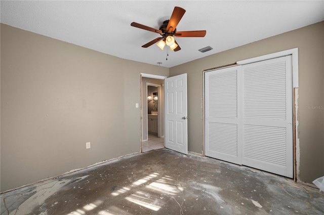 unfurnished bedroom with a closet and ceiling fan