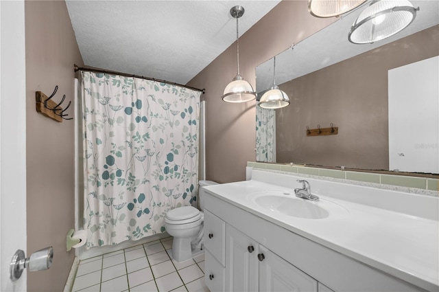 170 Chelsea Ct NW, Port Charlotte, FL 33952 - full bath with tile patterned floors, vanity, a textured ceiling, and shower / bathtub combination with curtain