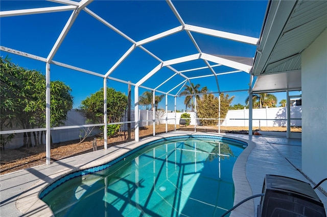 170 Chelsea Ct NW, Port Charlotte, FL 33952 - view of swimming pool featuring a fenced backyard, a lanai, and a patio area