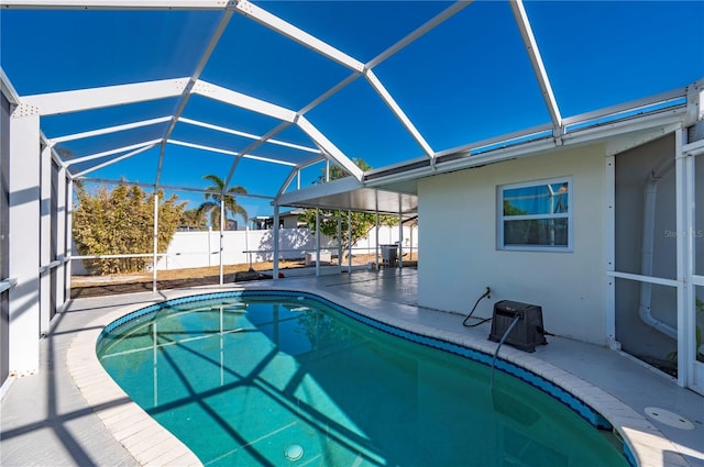 170 Chelsea Ct NW, Port Charlotte, FL 33952 - view of swimming pool featuring a patio and glass enclosure