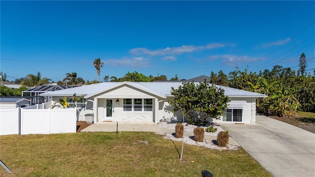 170 Chelsea Ct NW, Port Charlotte, FL 33952 - view of front of property with a metal roof and concrete driveway