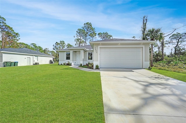 ranch-style home featuring a garage and a front yard