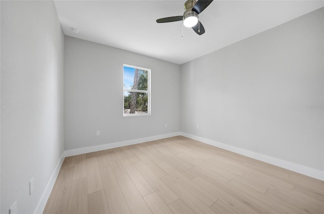 empty room featuring light hardwood / wood-style floors and ceiling fan