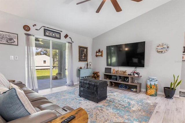 living room featuring vaulted ceiling, hardwood / wood-style floors, and ceiling fan