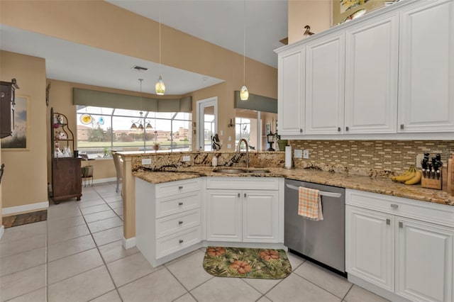 kitchen with dishwasher, sink, kitchen peninsula, and white cabinets