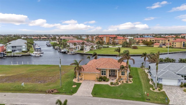 birds eye view of property featuring a water view