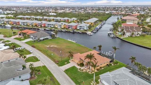 drone / aerial view with a water view