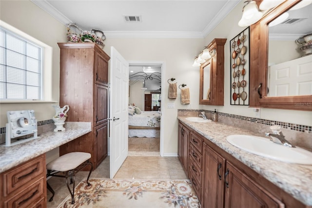 bathroom with vanity, tile patterned floors, and ornamental molding