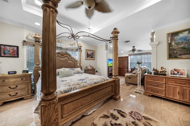 bedroom with ceiling fan, crown molding, and decorative columns