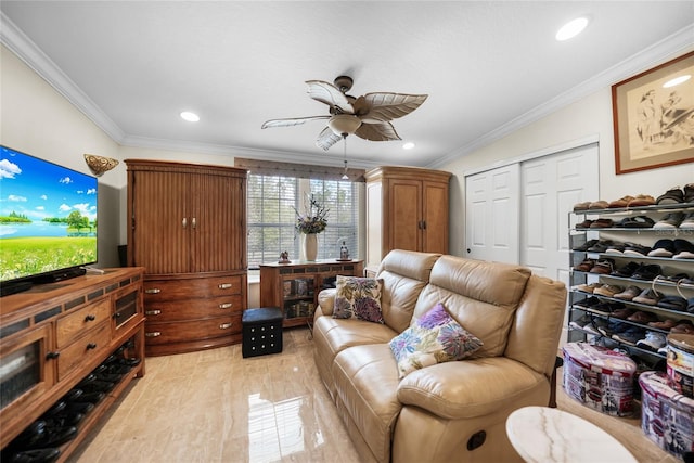 living room featuring ceiling fan and crown molding