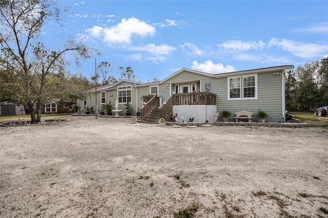 view of front of property featuring a deck