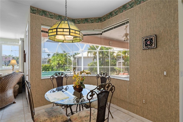 tiled dining area with a wealth of natural light