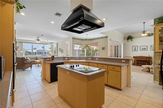 kitchen with black appliances, a kitchen island, island range hood, and light tile patterned floors