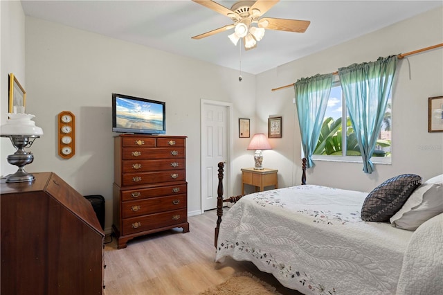 bedroom with light wood-type flooring and ceiling fan