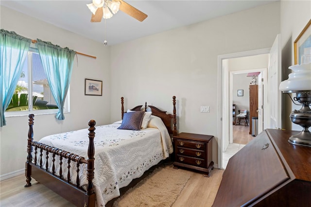 bedroom featuring ceiling fan and light wood-type flooring