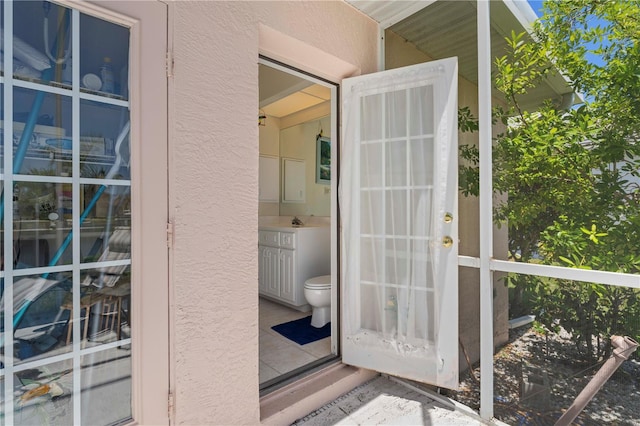 entrance to property featuring sink