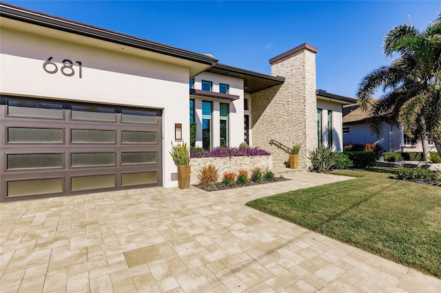 view of front of home with a front lawn