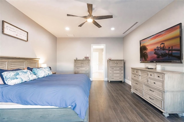 bedroom featuring connected bathroom, ceiling fan, and dark hardwood / wood-style floors