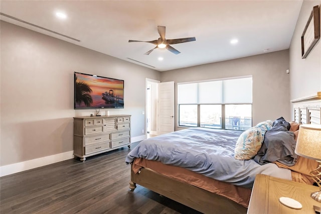 bedroom featuring ceiling fan and dark wood-type flooring