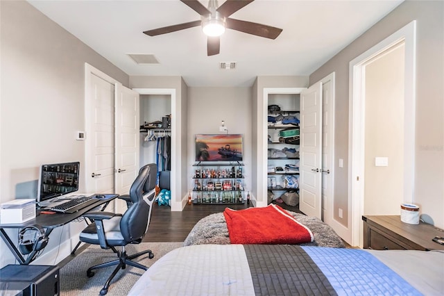 bedroom featuring ceiling fan and dark hardwood / wood-style floors