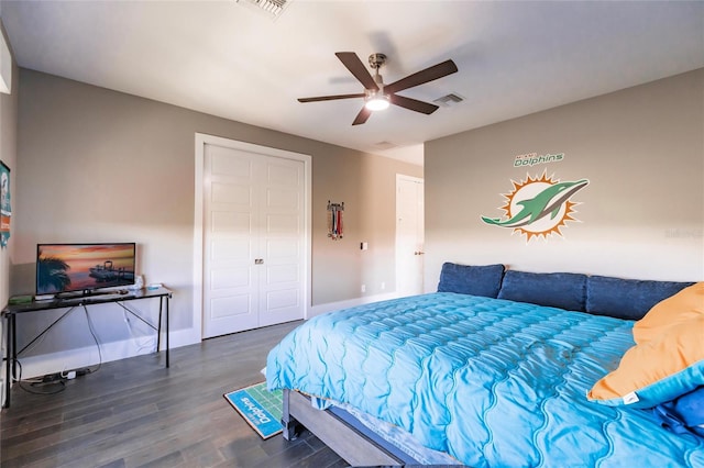 bedroom featuring ceiling fan and dark hardwood / wood-style flooring