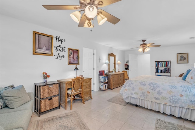 tiled bedroom with ceiling fan