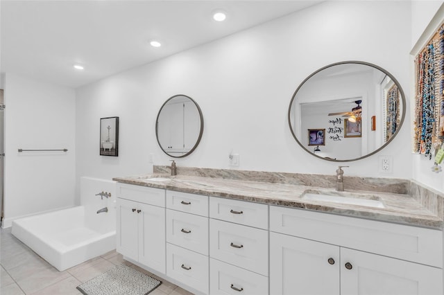 bathroom with tile patterned floors and vanity