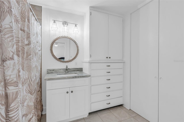 bathroom featuring tile patterned floors and vanity