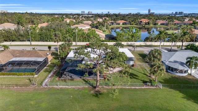 birds eye view of property featuring a water view