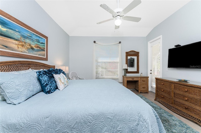 bedroom with ceiling fan and lofted ceiling