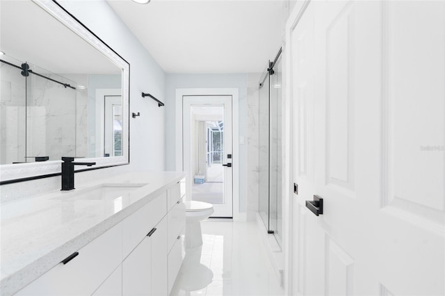 bathroom with walk in shower, vanity, and toilet