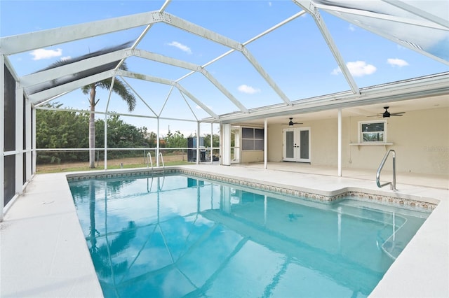 view of pool featuring a patio, a lanai, and ceiling fan