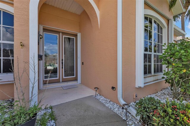 2388 Silver Palm Rd, North Port, FL 34288 - entrance to property featuring stucco siding