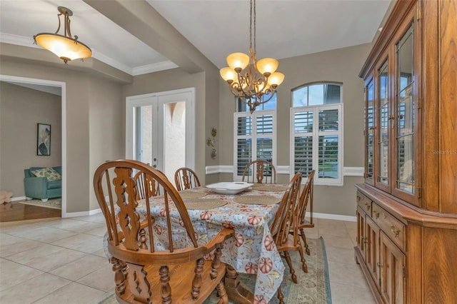 2388 Silver Palm Rd, North Port, FL 34288 - dining area with light tile patterned floors, plenty of natural light, a chandelier, and french doors